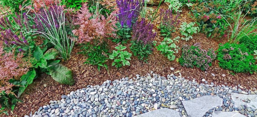 GreenAcresSnowLawn-Mulch-Moline Brand new rocks installed with new mulch as well.